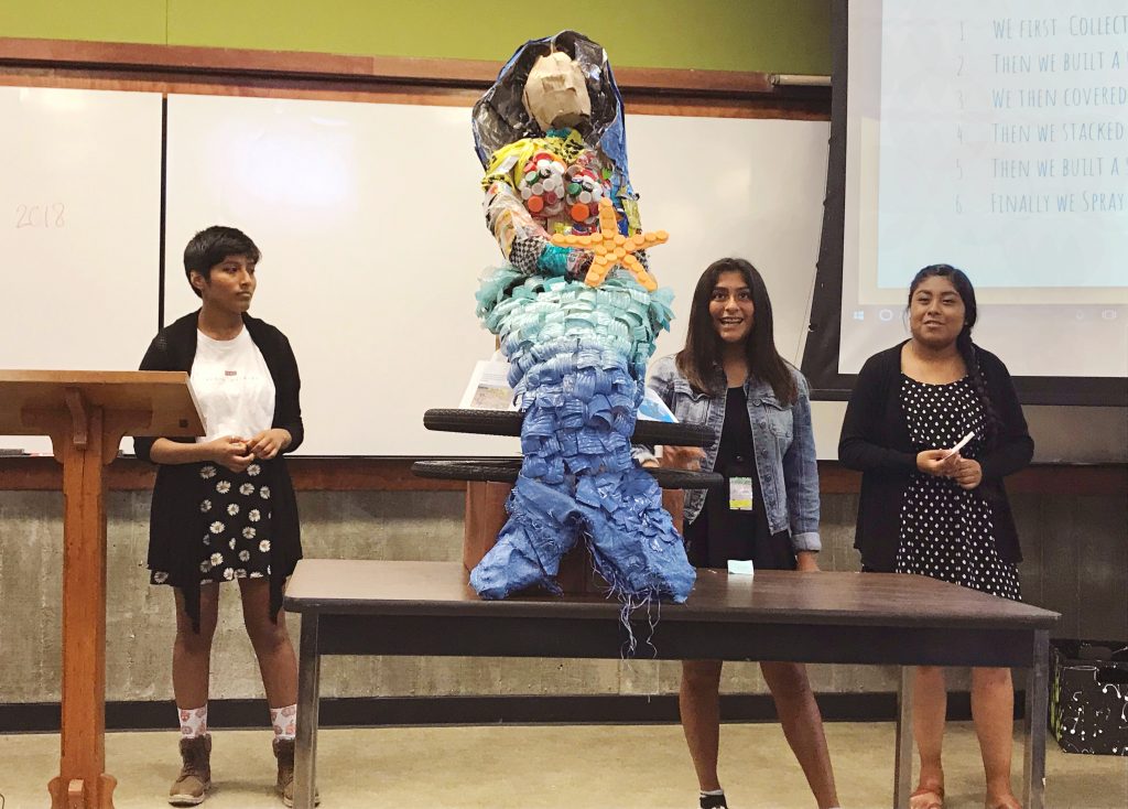 The students who created the mermaid sculpture presented their artwork to the crowd and explained its symbolism as well as the importance of reducing the amount of debris that enters the ocean.