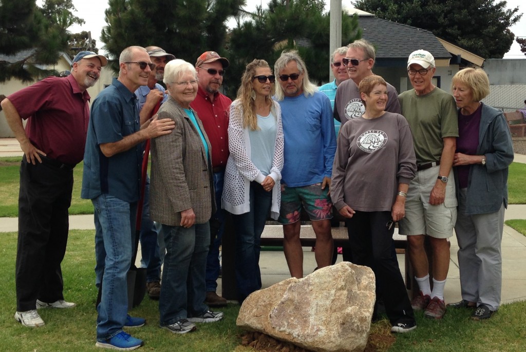 City of Morro Bay Mayor, Jamie Irons (in blue shirt on left), poses with members of the Historical Society of Morro Bay and the Morro Bay 50th Celebration Committee at the time capsule site. A plaque commemorating the event will be installed on the large rock that sits over the capsule.