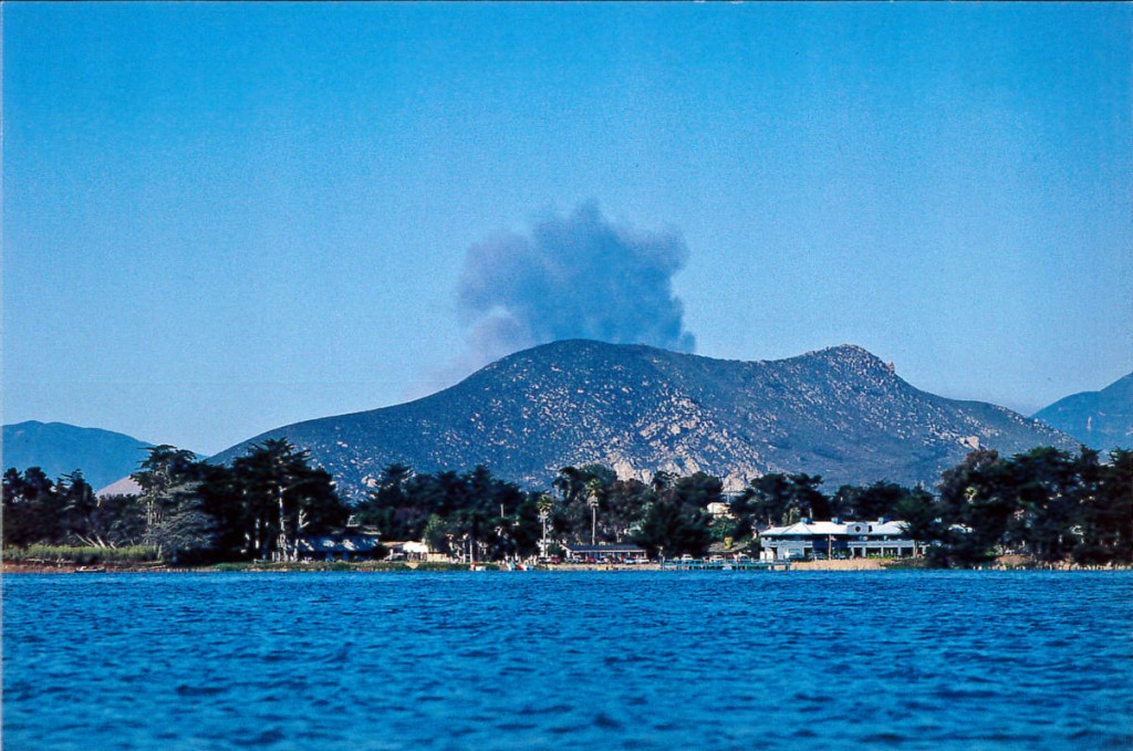 The smoke plume from the Highway 41 fire in August of 1994 begins. Photograph taken by Ruth Ann Angus from a kayak in the Morro Bay estuary.