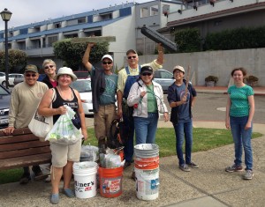 Volunteers celebrate their haul after Coastal Cleanup Day 2014