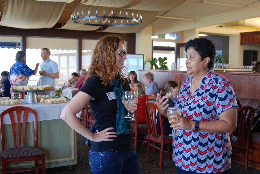 The Estuary Program’s Executive Director, Adrienne Harris (left), talks with Bay Foundation Board Member, Deanna Richards.