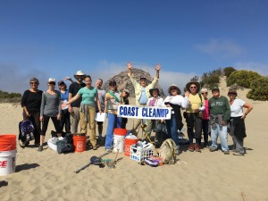 The whole crew celebrates their work and Coastal Cleanup Day.