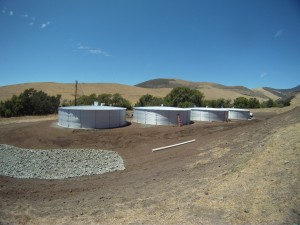 The four water-collection tanks on Cal Poly property can supply water for ranching operations during the summer, so that less water needs to be pumped from wells near Pennington Creek.