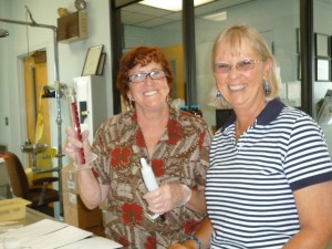 Karen Watts, right, works with a friend and fellow volunteer in the lab.