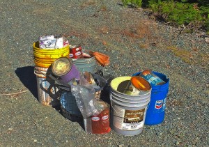 Photograph of household hazardous waste by The Bureau of Land Management. This waste was dumped on public lands (well outside of the Morro Bay watershed). Dumping like this causes problems when containers erode and chemicals leak out.