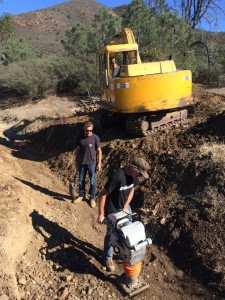 These workers prepare to install a culvert.