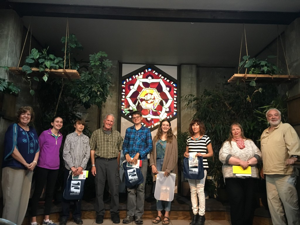 Our annual poetry contest encourages writers of all ages to write haiku and free verse poems about the estuary and the lands that drain into it. This photograph shows our 2017 contest winners and two of our judges at our celebratory reading at Coalesce Bookstore in Morro Bay.