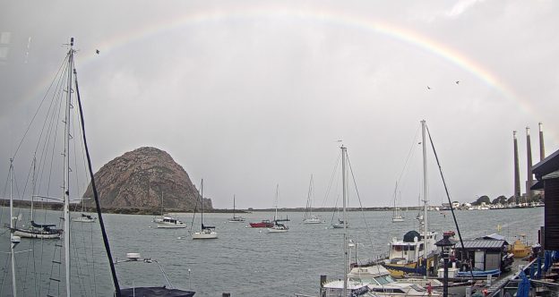 A rainbow arches over Morro Rock on a February morning.