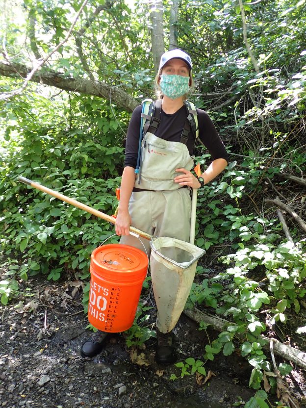 Monitoring Coordinator, Makenzie, sports a mask during fieldwork.