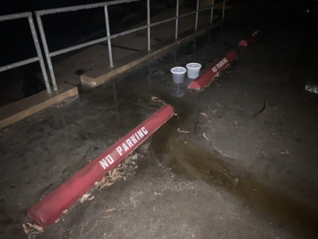 This is one of the eight First Flush monitoring sites in the Morro Bay State Park Marina parking lot. Stormwater moving through the parking lot exited through a cut in the curb and then flowed onto the kayak launch ramp and directly into the bay.