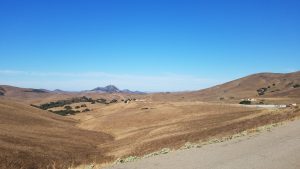 Brown hills lead down to the bay in this photograph taken from the upper reaches of Chorro Creek.