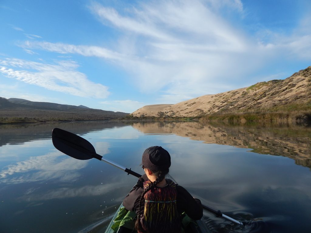 This photo shows one of our two volunteers of the year, Pam, paddling near Sharks Inlet in Morro Bay. 