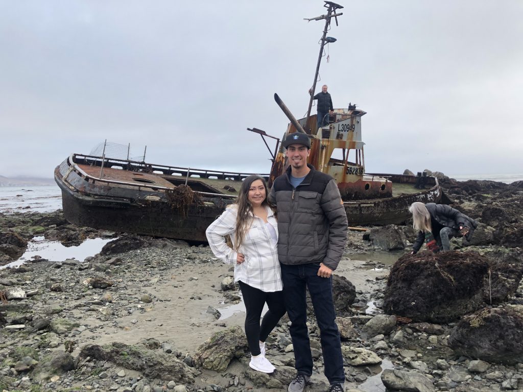 Nick and his wife Alyssa by a shipwreck near Cayucos.